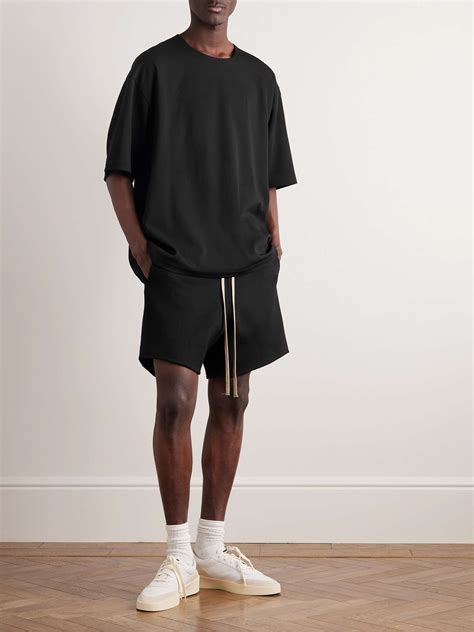 fear of god black shorts|More.